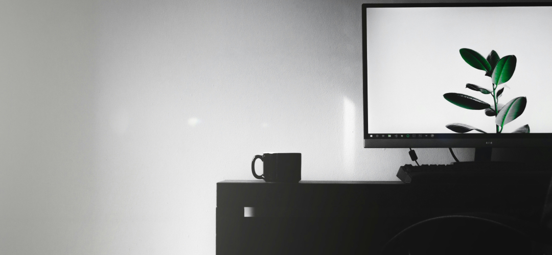 Cup sitting on a person's desk